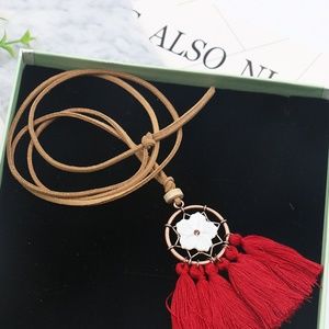 Tassel Pendant Earrings with a Flower Detail